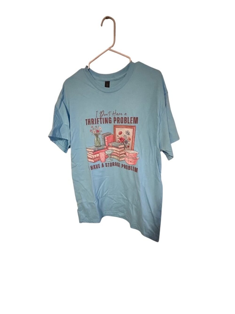 New graphic t-shirt on a Gildan blue in color 100% cotton storage probem  size L